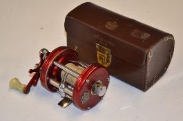 Abu Ambassador 6000 red level wind multiplier reel, 4 screw, single counterbalance handle (white