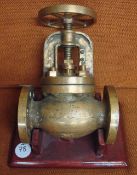Brass Valve taken from a German Ship - Von Hdr.Entw.Leit, stamped MT2, mounted to a wooden base,