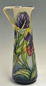 Moorcroft Pottery Tall Jug with Iris pattern measures 25cm approx. appears in good condition
