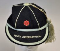 Youth International Cap with a Red Rose stitched to front and Youth International to peak in blue