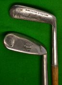 Interesting A Patrick Leven heavy mussel back well lofted mashie and a Nicoll Leven Gem putter (2)