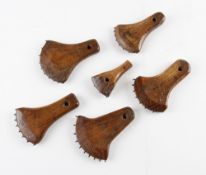 Tennis Racket Fabrication Tools - Marking Out Tools - a selection of wooden axe shaped tools with