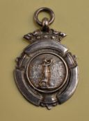 Ladies silver hallmarked golf medal - with embossed Vic lady golfer on the obverse
