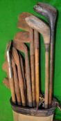 Collection of 16x golf clubs and golf bag - a driver, brassie, selection of irons from a long iron