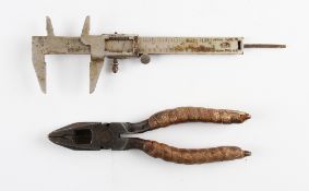 Tennis Racket Fabrication Tools to include a Vernier Caliper for handle measurements together with a
