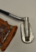 Miracle adjustable iron c/w key and a leather head cover
