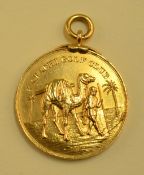 Rare 1908 Karachi Golf Club yellow metal winners medal - the reverse engraved 