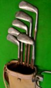 Matching set of 5x irons and putter stamped Alex Sime and retailer A Milliner Dunedin New