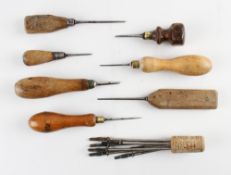 Various Tennis Racket Fabrication Tools includes a selection of tools with wooden handles and