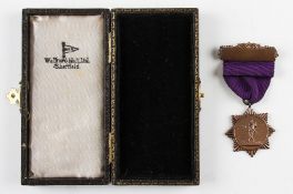 1949 England v Scotland Boys International bronze golf medal c/w ribbon and bar - engraved on the