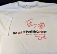 Autograph - Paul McCartney Signed T-Shirt a white T-Shirt with red inscription to the front, dated