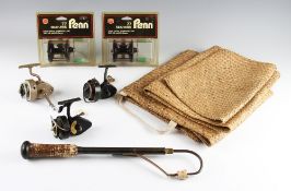 Gaff ,Wicker Bass carrying bags and various reels (8): Alloy brass and steel 2x drawer gaff c/w