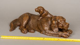 A large 19th century Black Forest carved wooden animalier group Formed as a Labrador Retriever and