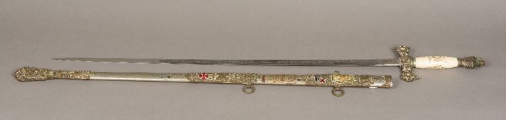 A 19th century Masonic sword With engraved ivory handle Knights helmet finial,
