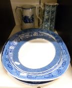 A collection of blue and white meat plates,