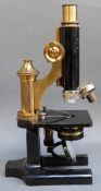 A cased R Winkel microscope with Zeiss lenses