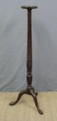 A late 19th/early 20thC mahogany reeded torchere,