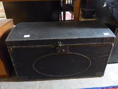 A 19th/20thC dome topped stud work trunk,