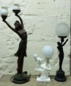 Three decorative figural lamps, one in the form of semi nude dancing lady,