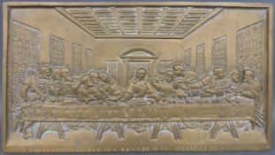 A brass plaque of The Last Supper,