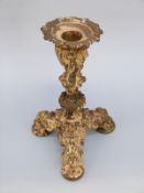 A 19thC ornate bronze / brass candlestick,