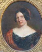 A 19thC oval oil on canvas portrait of a lady,