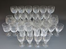 A suite of cut glass drinking glasses comprising six red wine, six white wine, six whisky,