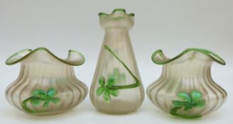Kralik iridescent glass garniture of three vases with fluted bodies and applied green floral
