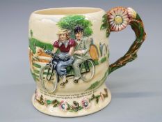 A Crown Devon Daisy Bell mug (musical movement missing)