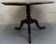 A 19thC mahogany tilt top coffee table,