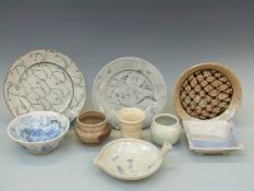 Nine pieces of studio pottery by Barry Wade, all stoneware with incised or brushed decoration,