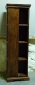 A modern hardwood revolving bookcase,