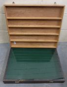 A table top display cabinet and a hanging shelf unit,