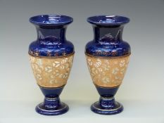 A pair of Doulton Slaters pedestal vases, 27.