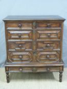 An 18thC oak chest of five drawers on stand in the Carolean style,