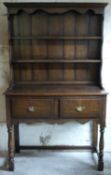 A small oak two drawer dresser,