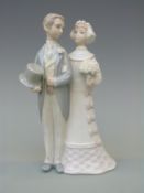 A Lladro figure of a bride and groom,