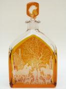 Orrefors clear and amber glass flash overlaid decanter etched with hunting scenes,