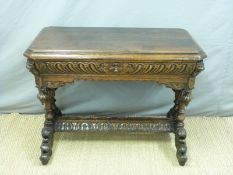 A 19thC carved oak hall or centre table with single drawer and heavily carved details,