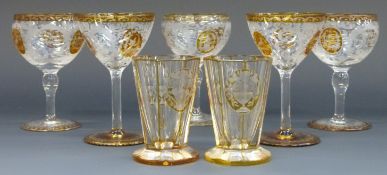 Five flash overlaid and etched wine glasses with amber overlay over clear ground and engraved