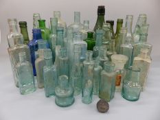A collection of large vintage bottles relating to Cirencester, Cheltenham, Plymouth,