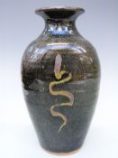 Winchcombe Pottery stoneware vase of shouldered flattened form with black iron speckled glaze,