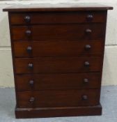 A stained pine 19thC collector's or apprentice chest of six graduated drawers with various sized