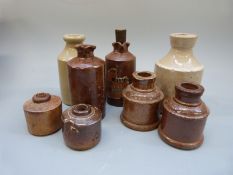A collection of small 19th/20thC glass bottles