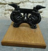 A cast iron boot scraper