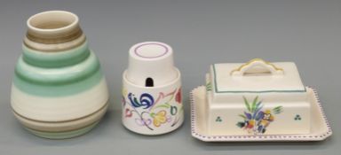 Three pieces of Poole Pottery including butter dish, banded vase and sugar bowl,