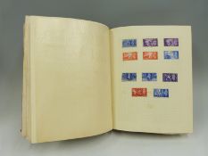 An album of mainly GB and Indian States stamps,