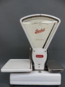 A set of Berkel shop scales with 'new price' scales with pence per pound scale to reverse,