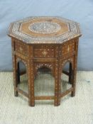 An octagonal Anglo-Indian ivory inlaid table,