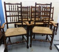 A set of 8 (6+2) country style rush seated dining chairs with turned spindle backs